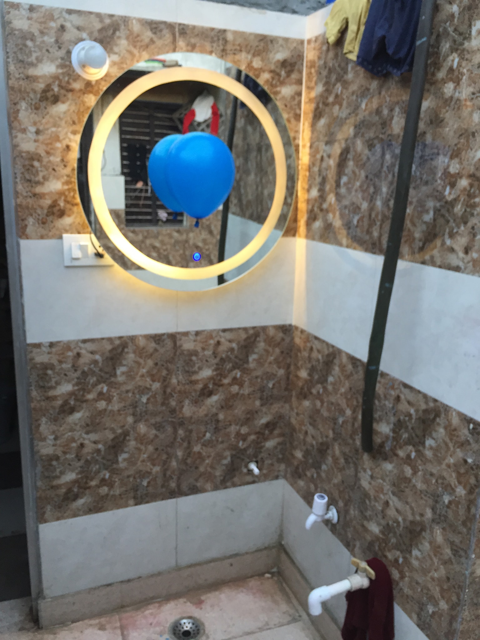 Round Backlit Mirror Installed